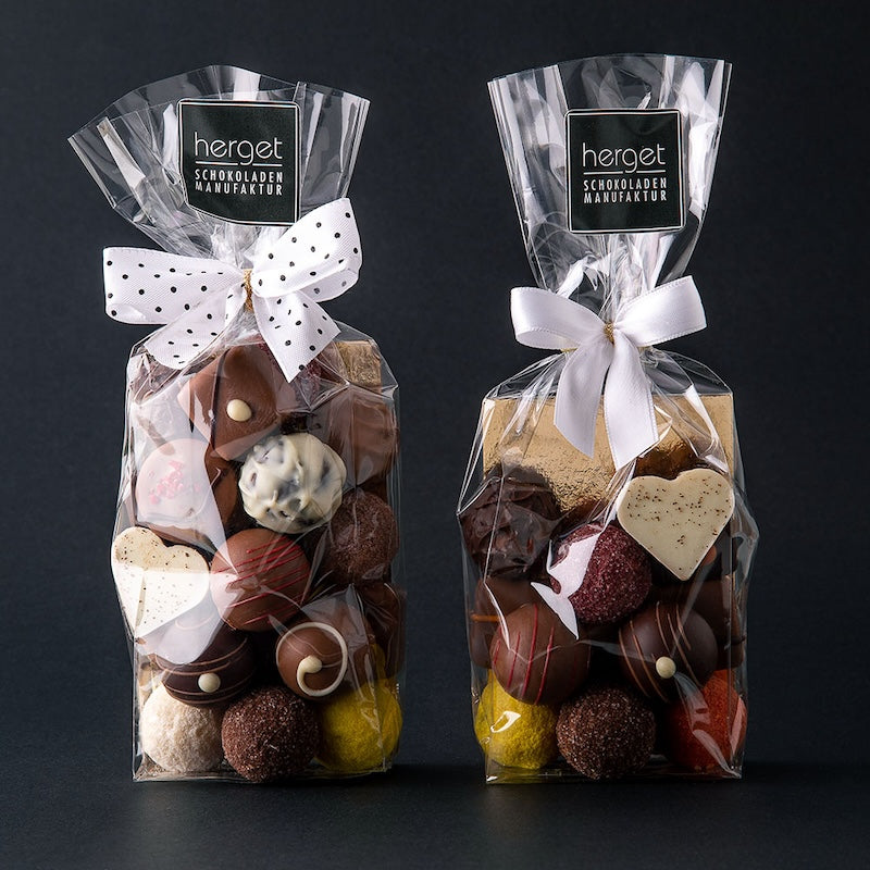 
                  
                    Pralinenmischung im Beutel mit 250g und 150g Inhalt handgemacht von herget Schokoladenmanufaktur
                  
                
